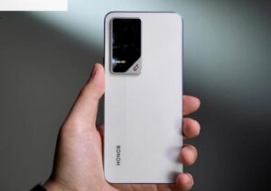 Honor GT Pro in Cyber Silver color with gaming accessories