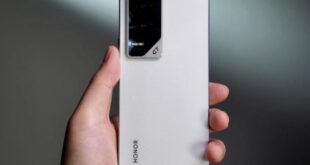 Honor GT Pro in Cyber Silver color with gaming accessories